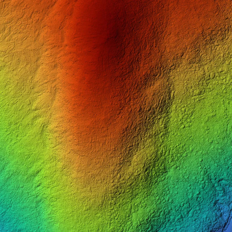 LiDAR terrain model of a long, ridge-shaped mound, coloured by height.